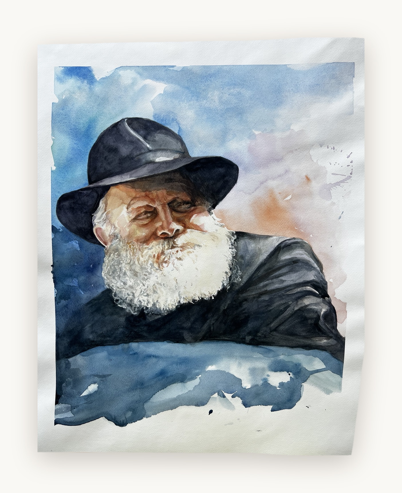 Watercolor portrait of the Lubavitcher Rebbe in a black hat against a blue sky